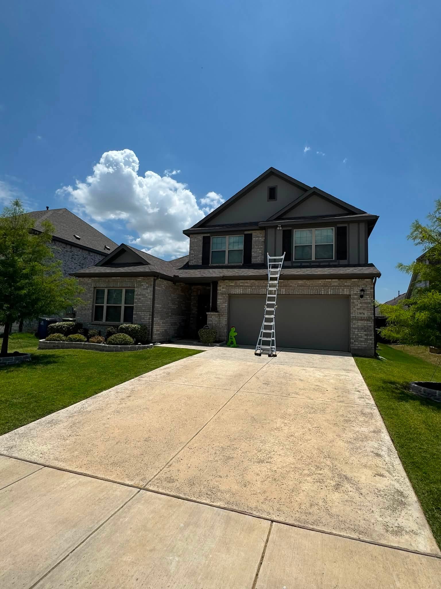 Fireman's Roofing ladder set on a Melissa area home for roof access