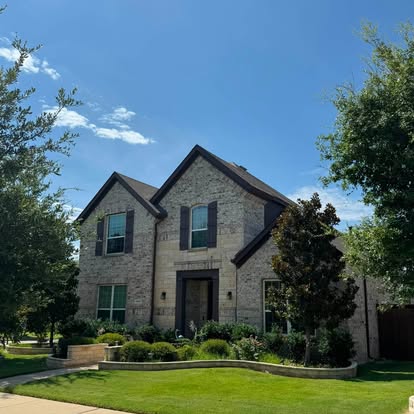 Completed roof replacement on a North Texas residential home by Fireman's Roofing